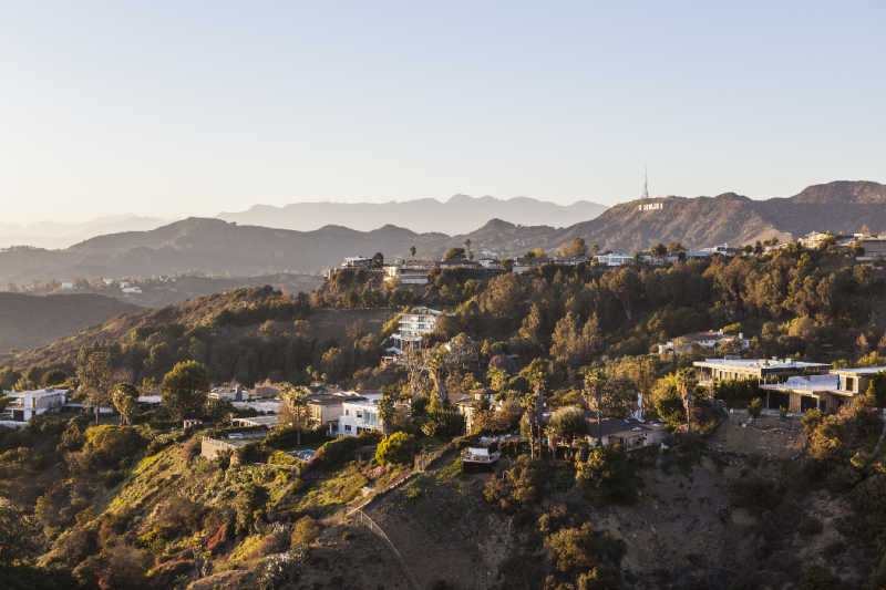 An aerial shot of the Hollywood Hills in California, showing their yards.