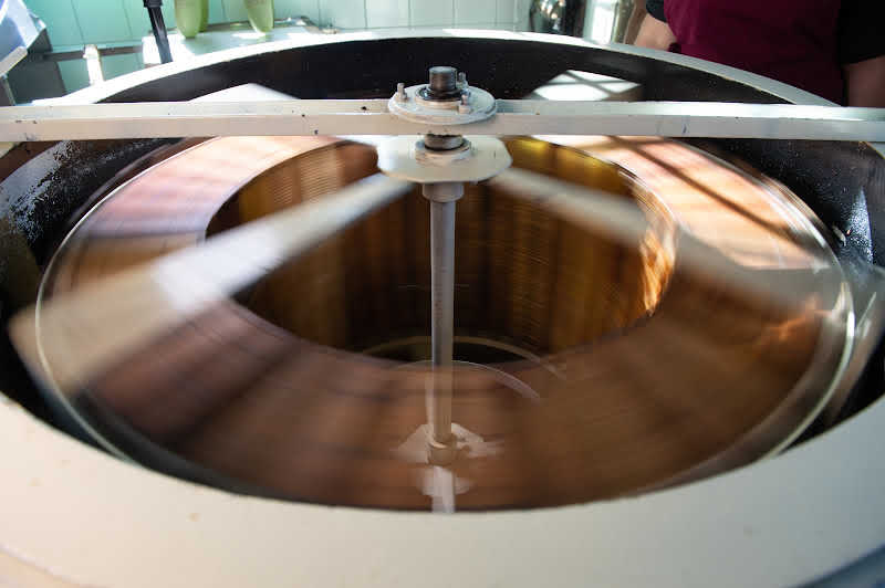A blurred image showing an extractor getting spun a full speed