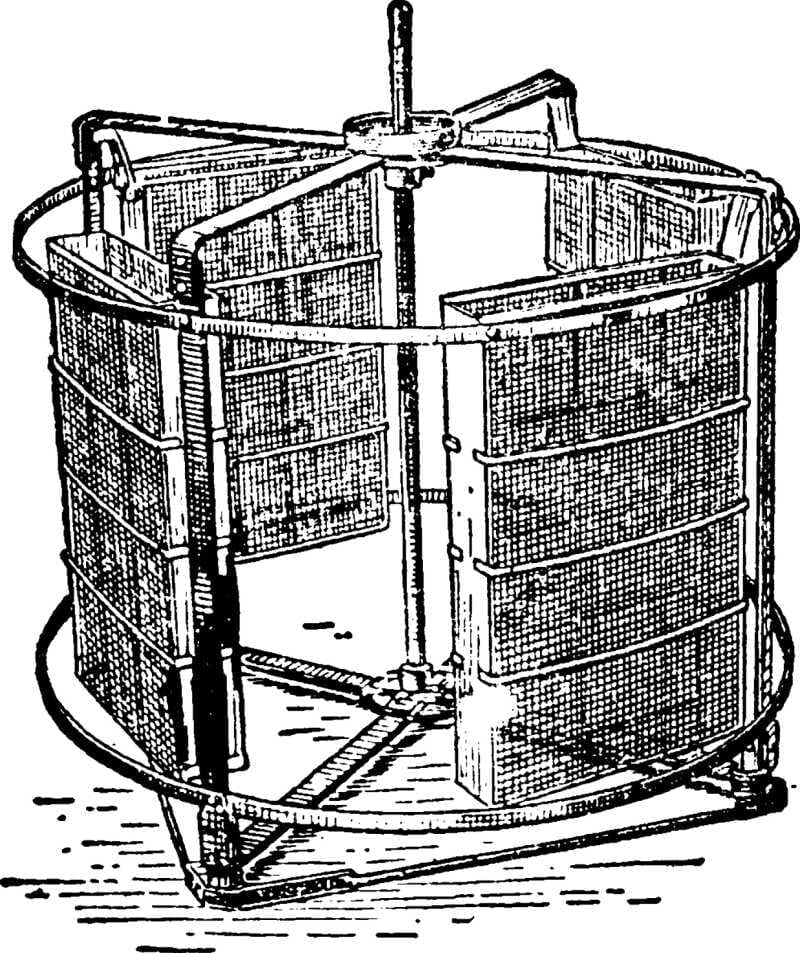 A black and white illustration of T.W. Cowan's honey extractor
